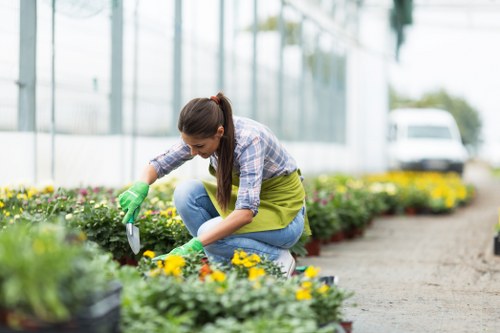 Front view of a gardener inspecting a garden